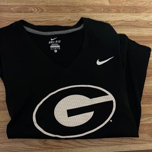 Brand new DRI-FIT Nike V neck running shirt. Size medium. Worn 2x, perfect shirt